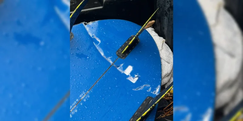 Albert Westpfal's damaged blue surfboard after the shark attack at China Walls