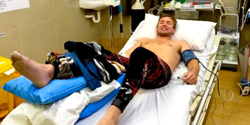 Henry Gibbs in hospital in Fiji after shark bite